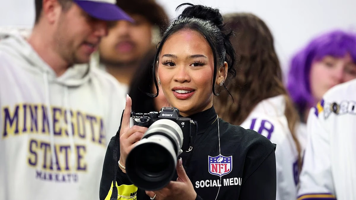 US Olympic hero Suni Lee spotted working as a photographer at NFL Christmas Day game