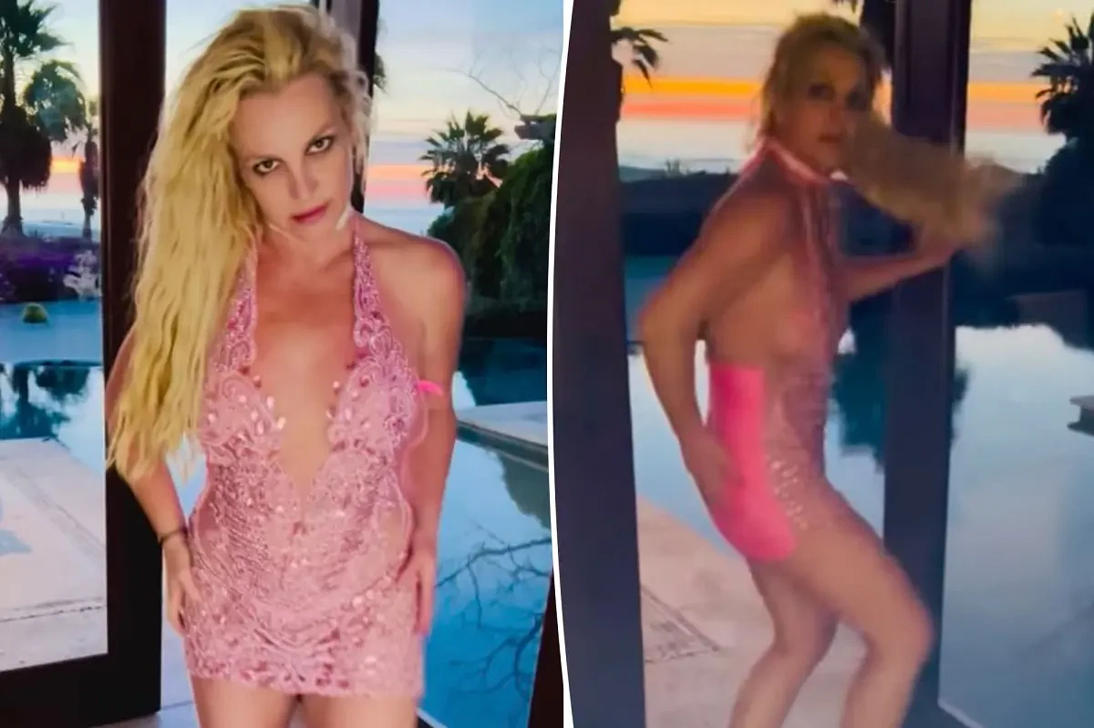 Britney Spears slaps her butt while dancing in hot pink mini dress following reported restaurant drama