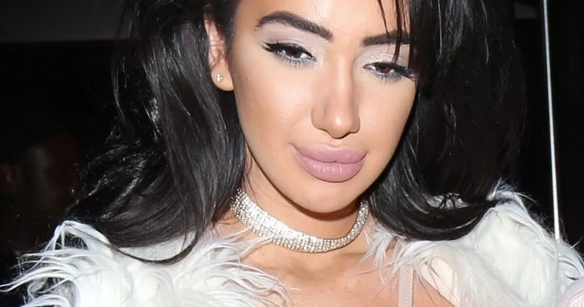 Braless Chloe Khan suffers MAJOR nip slip as she parties up a storm as sexy Mrs Claus