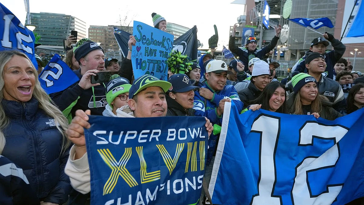 Seahawks star Ernest Jones IV tells doubters 'f*** you!' at wild Super Bowl parade rally in Seattle