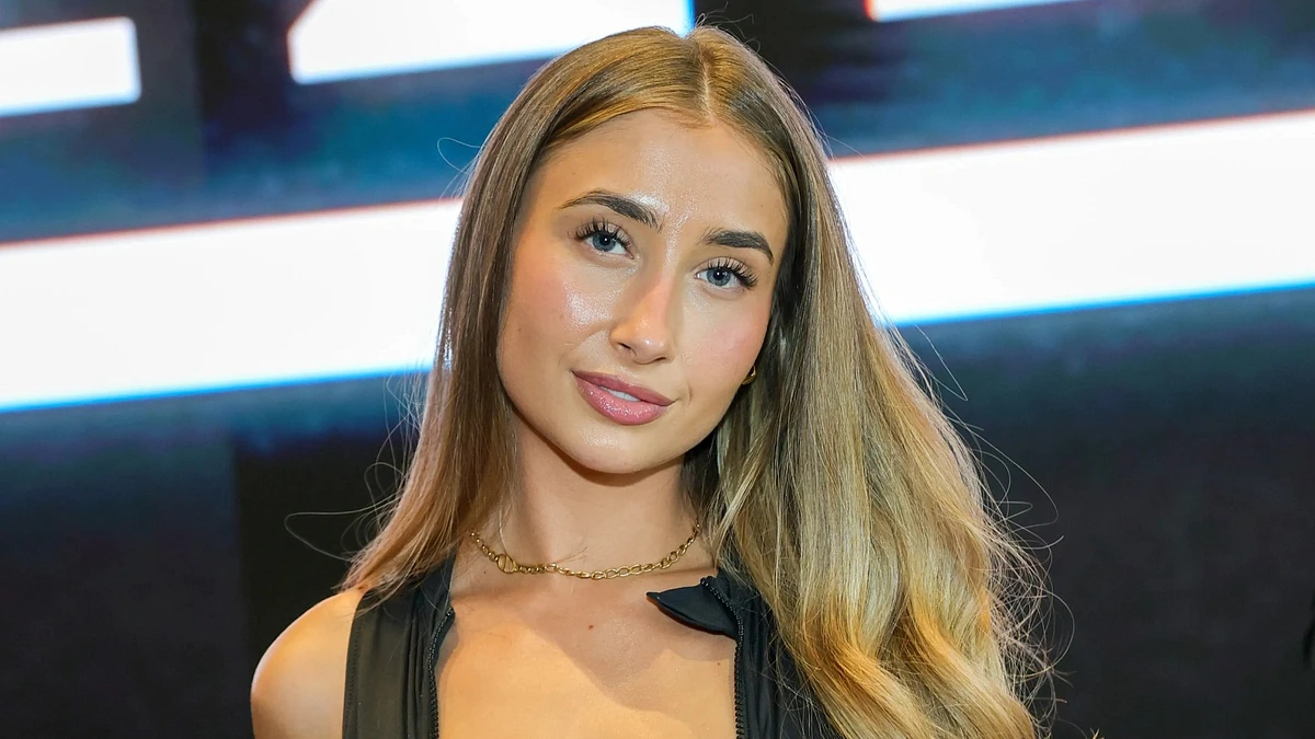 Lily Phillips horrifies neighbourhood as she buys mansion & adorns car with pics