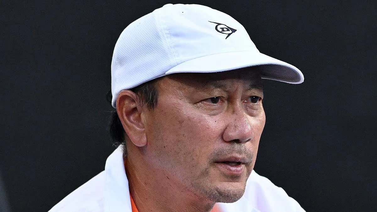 Grand Slam-winning tennis legend is spotted at the Australian Open - so do you know who it is?