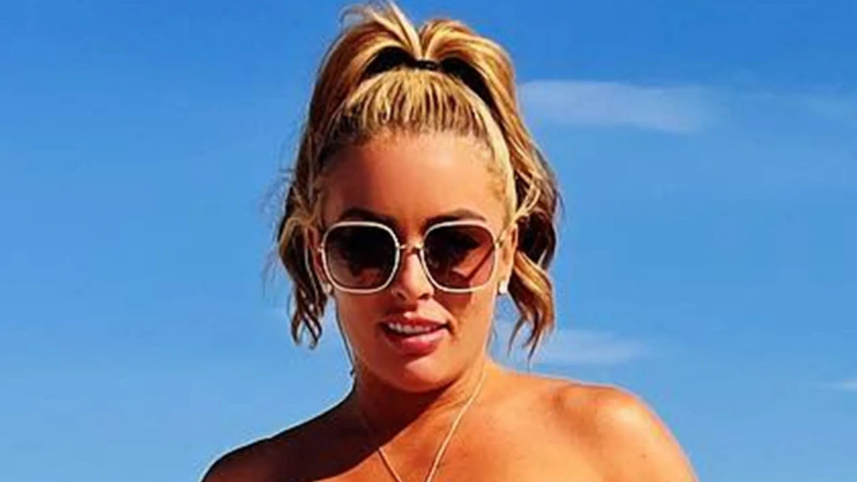 Mandy Rose shows off peachy bum and toned abs in barely-there bikini as fans say 'it doesn’t get any better than that'