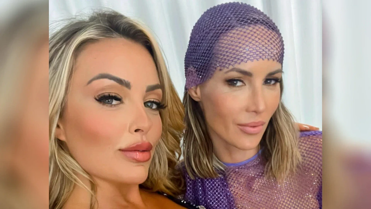 Swimmer goes braless in see-through outfit during steamy shoot with ex-WWE star