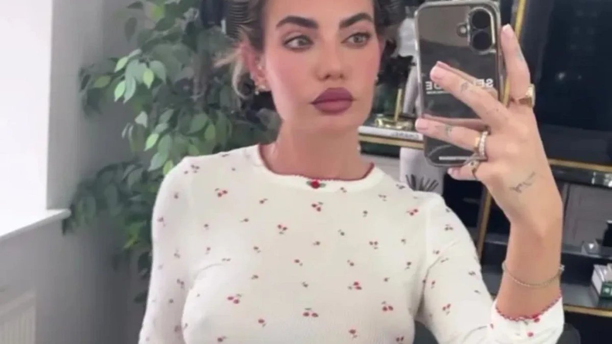Love Island's Megan Barton-Hanson goes braless beneath T-shirt as she shows off figure in mirror