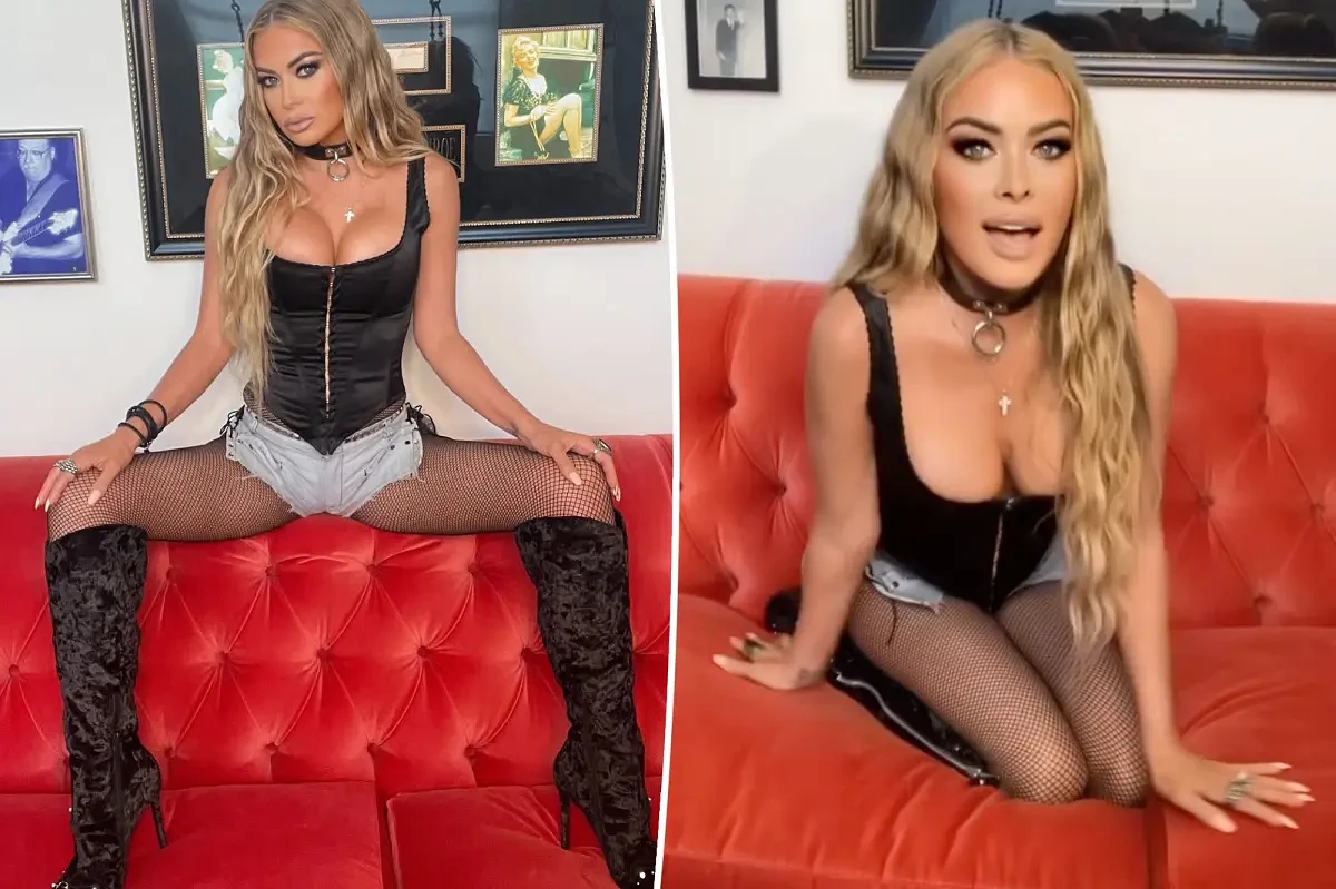 Carmen Electra, 53, rocks corset top and fishnet stockings in racy at-home photo shoot